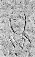 Portrait of a collared man. Aron Packer photo. Chicago lakefront stone carvings, Montrose Harbor.