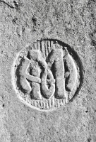 Monogram. Aron Packer photo. Chicago lakefront stone carvings, Montrose Harbor.