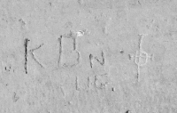 KB N UG, elaborate cross. Chicago lakefront stone carvings, between Foster Avenue and Montrose. 2017 KB N UG, elaborate cross. Chicago lakefront stone carvings, between Foster Avenue and Montrose. 2017