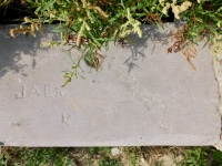 Jack, Butch, symbols, unreadable name. Chicago lakefront stone carvings, Montrose Dog Beach. 2022