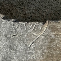 RYA in heart, broken, detail. Chicago lakefront stone carvings, near Montrose Beach. 2023 RYA in heart, broken, detail. Chicago lakefront stone carvings, near Montrose Beach. 2023