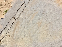 Manuel with heart and ribbons. Chicago lakefront stone carvings, Montrose Beach. 2015