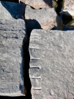TE +, E.M. J.M. Chicago lakefront stone carvings, south of La Rabida Hospital. 2025