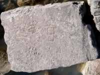 Autograph rock: Red O'Brien, CE, Bill Burt(?) Betty, JL, Sunny, Bern, Juru, Ronny, JT, others. Chicago lakefront stone carvings, south of La Rabida Hospital. 2025