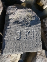 J. KIR, WB, VM, NS. Chicago lakefront stone carvings, south of La Rabida Hospital. 2025