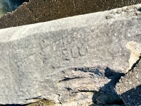 ELL, above Dutch. Chicago lakefront stone carvings, between 45th Street and Hyde Park Blvd. 2023