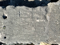 Cross, B+M. Chicago lakefront stone carvings, between 45th Street and Hyde Park Blvd. 2023