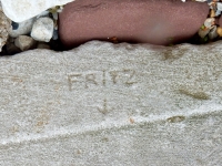 Fritz, with arrow. Chicago lakefront stone carvings, between 45th Street and Hyde Park Blvd. 2019