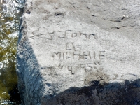 Heart with arrow, John L/S Michelle "9/95." Chicago lakefront stone carvings, between 45th Street and Hyde Park Blvd. 2019 Heart with arrow, John L/S Michelle "9/95." Chicago lakefront stone carvings, between 45th Street and Hyde Park Blvd. 2019