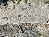 1963, PS, EM, Tom, Brighton Park. Chicago lakefront stone carvings, between 45th Street and Hyde Park Blvd. 2023