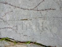 Mark. Chicago lakefront stone carvings, between 45th Street and Hyde Park Blvd. 2019 Mark. Chicago lakefront stone carvings, between 45th Street and Hyde Park Blvd. 2019