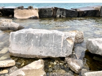 W, W. Chicago lakefront stone carvings, between 45th Street and Hyde Park Blvd. 2019