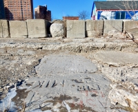 Autograph rock with Mike, Christ and many more, with the 49th Street beach house and Hyde Park in the background. Chicago lakefront stone carvings, between 45th Street and Hyde Park Blvd. 2018