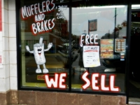 Window detail. 6 Stars Auto Body & Muffler, Lawrence Avenue near Sacramento