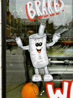 Painted muffler man. 6 Stars Auto Body, an artistic extravaganza on Lawrence near Sacramento