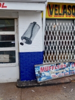 This Velasquez muffler shop is on Elston Avenue on Chicago's northwest side This Velasquez muffler shop is on Elston Avenue on Chicago's northwest side