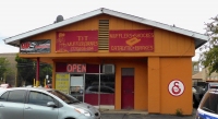 T&T Muffler & Brakes storefront, Addison Street at Cicero, Chicago