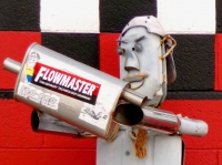 Muffler person closeup showing facial details, Chacon's Mufflers, Federal Blvd., Denver, Colorado