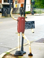 6 Stars Auto Body sidewalk muffler person in July 2011, before it was spruced up. Exceptional face and hand on this figure. 3 Stars has a proven commitment to automotive art. Lawrence Avenue near Sacramento, Chicago