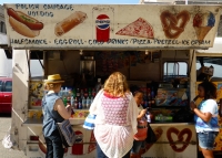 Customers ordering at food stand with many painted menu items, Street Food Vendor sign art, National Mall, Washington D.C.