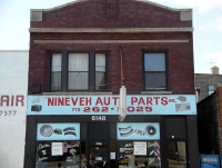 A highly graphic auto business, circa 2004. Nineveh Auto Parts, Clark Street near Granville, Chicago-Roadside Art