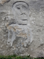 Enigmatic figure, Easter Island style, detail. Chicago lakefront stone carvings at Fullerton. 2018