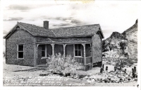 Bottle house in the ghost city of Rhyolite, Nevada, postcard