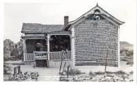 Bottle house in the ghost city of Rhyolite, Nevada, postcard