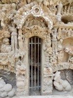 Small figure and gate, Le Palais Idéal du Facteur Cheval, Hauterives, France