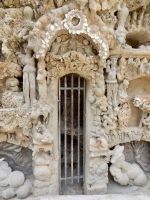 Small figure and gate, Le Palais Idéal du Facteur Cheval, Hauterives, France Small figure and gate, Le Palais Idéal du Facteur Cheval, Hauterives, France