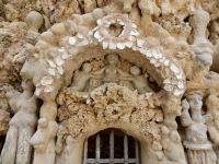 Small figure and and arch above gate, Le Palais Idéal du Facteur Cheval, Hauterives, France Small figure and and arch above gate, Le Palais Idéal du Facteur Cheval, Hauterives, France