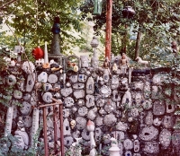 Wire encased wall at Howard Finster's Paradise Garden, circa 1990