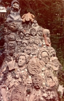 Mound of faces at Howard Finster's Paradise Garden, circa 1990