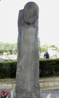 Memorial to Auschwitz victims, Pere Lachaise Cemetery, Paris. The figure looks a bit uncomfortably like an alien
