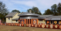 Side of the compound and back porch structure, St. Eom's Pasaquan, 2016