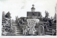 Capitol Building and American flag at Peterson's Rock Garden, between Bend and Redmond, Oregon, postcard