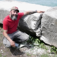 Joel Cardenas with his portrait carving Joel Cardenas with his portrait carving