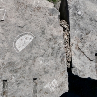 Fruit slice, tiff, circle. Chicago lakefront stone carvings, Promontory Point. 2026