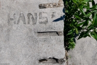 Hans = +. Chicago lakefront stone carvings, Promontory Point. 2020