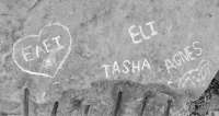 EAEI and eye in heart, Tasha, Eli, Agnes and bunny, made by three generations of one family during the Oct. 9, 2022, Promontory Point carving workshop. Chicago Lakefront stone carvings, Promontory Point. 2022