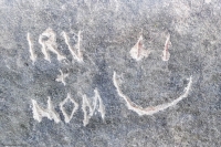 Irv + Mom, smiley face, detail, made during the Oct. 9, 2022, Promontory Point carving workshop. Chicago Lakefront stone carvings, Promontory Point. 2022