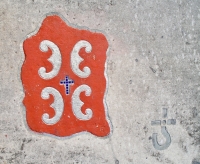 Heraldic shield from the Serbian flag. Note the earlier blue tile inlays. Blue Oyster Cult logo. Level 5. Chicago lakefront stone carvings, Promontory Point, Hyde Park. 2005