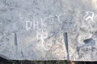 DHKSY, flower, arrow, made during the Oct. 9, 2022, Promontory Point carving workshop. Level 5. Chicago Lakefront stone carvings, Promontory Point. 2022 DHKSY, flower, arrow, made during the Oct. 9, 2022, Promontory Point carving workshop. Level 5. Chicago Lakefront stone carvings, Promontory Point. 2022