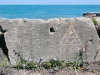 Waves, Izzard pyramid, made during May 28, 2022, carving day. Level 5, vertical. Chicago lakefront stone carvings, Promontory Point. 2023 Waves, Izzard pyramid, made during May 28, 2022, carving day. Level 5, vertical. Chicago lakefront stone carvings, Promontory Point. 2023