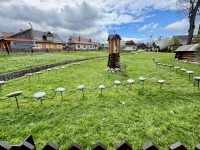 Shrine and interesting fence at the 15th century St. Michael Archangel's Church in Dębno