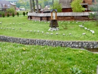 Shrine and interesting fence at the 15th century St. Michael Archangel's Church in Dębno