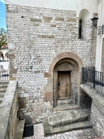 Original entrance to the Church of St. Adalbert, now several feet lower than the surrounding square.