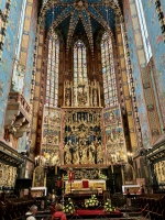 The 14th century St. Mary's Basilica in Krakow. Per WIkipeda, "the altarpiece was carved between 1477 and 1489 by the German-born sculptor Veit Stoss (known in Polish as Wit Stwosz) who lived and worked in the city for over 20 years." Also per Wikipedia: "In 1941, during the German occupation, the dismantled altarpiece was shipped to the Third Reich on the order of Hans Frank – the Governor-General of that part of occupied Poland. It was recovered in 1946 in Bavaria, hidden in the basement of the heavily bombed Nuremberg Castle. The High Altar underwent major restoration work in Poland and was put back in its place at the Basilica 10 years later."