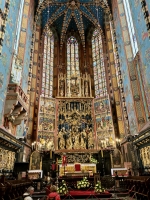 The 14th century St. Mary's Basilica in Krakow. Per WIkipeda, "the altarpiece was carved between 1477 and 1489 by the German-born sculptor Veit Stoss (known in Polish as Wit Stwosz) who lived and worked in the city for over 20 years." Also per Wikipedia: "In 1941, during the German occupation, the dismantled altarpiece was shipped to the Third Reich on the order of Hans Frank – the Governor-General of that part of occupied Poland. It was recovered in 1946 in Bavaria, hidden in the basement of the heavily bombed Nuremberg Castle. The High Altar underwent major restoration work in Poland and was put back in its place at the Basilica 10 years later." The 14th century St. Mary's Basilica in Krakow. Per WIkipeda, "the altarpiece was carved between 1477 and 1489 by the German-born sculptor Veit Stoss (known in Polish as Wit Stwosz) who lived and worked in the city for over 20 years." Also per Wikipedia: "In 1941, during the German occupation, the dismantled altarpiece was shipped to the Third Reich on the order of Hans Frank – the Governor-General of that part of occupied Poland. It was recovered in 1946 in Bavaria, hidden in the basement of the heavily bombed Nuremberg Castle. The High Altar underwent major restoration work in Poland and was put back in its place at the Basilica 10 years later."