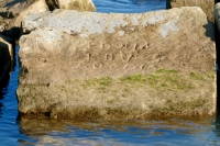 Edwin Loves Edwina, detail. Chicago lakefront stone carvings, south of La Rabida Hospital. 2021 Edwin Loves Edwina, detail. Chicago lakefront stone carvings, south of La Rabida Hospital. 2021